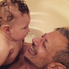 A loving parent embracing a child.