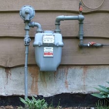 Gas and electric utility meters mounted together