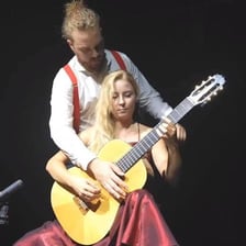 Two performers appearing together as a duo