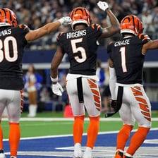 A football player celebrating a touchdown with a dance.