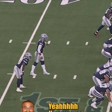A quarterback calling pre-snap signals behind the center.