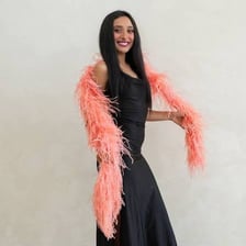 A colorful feather boa worn as a wrap