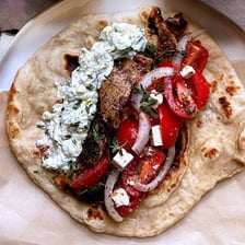 A round pita bread used for a gyro wrap.