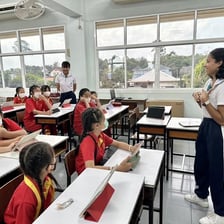 International students attending an English-language classroom lesson.