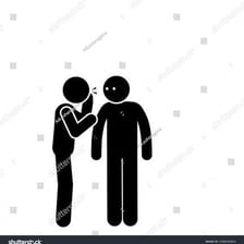One person discreetly helping another person communicate.