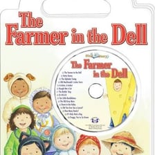 Children singing a traditional nursery rhyme in a circle