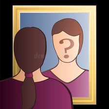 A person looking at their reflection in a mirror