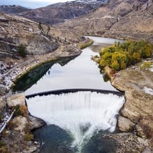 A dam blocking the flow of a river.