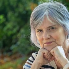 Portrait of an older adult with gray hair