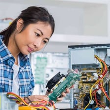 A technology enthusiast working at a computer