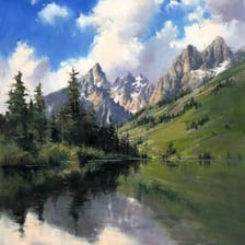 A grand mountain landscape viewed beneath a wide sky.