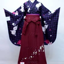 A furisode kimono secured with a traditional obi sash