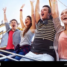 Friends having an enjoyable time at an amusement park