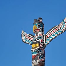 Carved Indigenous totem poles