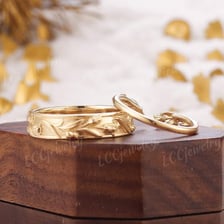A married couple wearing wedding rings during a wedding ceremony