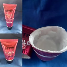 An empty tube showing that all of its contents have been used