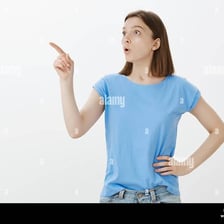 A person pointing toward something to emphasize a point