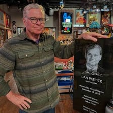 A portrait of sportscaster Dan Patrick