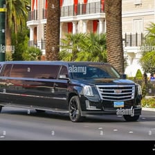 A long stretch limousine on a roadway