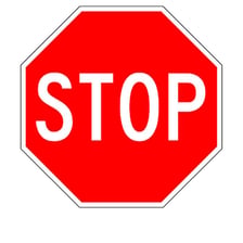 A red stop sign used to tell someone to halt
