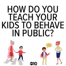 A parent calmly reminding a child to behave in a public place.