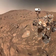 A NASA rover exploring the rocky surface of Mars.