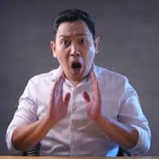 A person visibly exclaiming in surprise