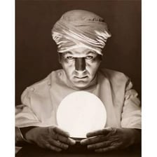 A fortune teller looking into a crystal ball.