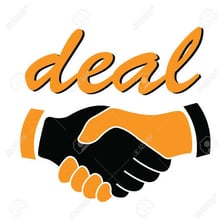 Two people shaking hands to signify an agreement