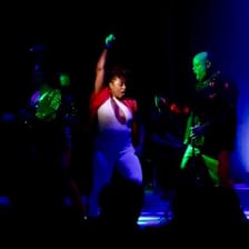 A performer returning to the stage for an encore.