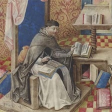 A medieval scribe writing or copying a manuscript at a desk.