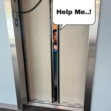 An elevator stopped between floors, illustrating the phrase “let you down”