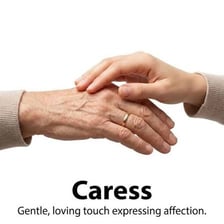 A hand giving a gentle affectionate touch