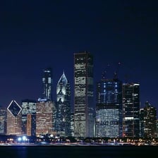 A city skyline illuminated at night