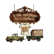 A storefront sign using the phrase “Ye Olde Shoppe.”