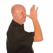 A person appearing playful and not engaged in serious work