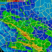 A weather radar display showing a storm system