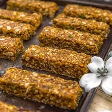 A granola bar with visible oat pieces.