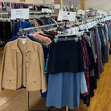 Previously owned clothing displayed in a thrift store