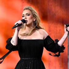 Adele performing onstage