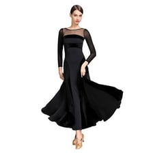 Women in formal gowns attending a ball.