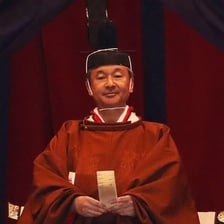 The Japanese emperor attending an official ceremonial event.