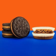 Oreo cookies and Reese's peanut butter cups shown together