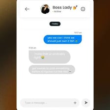A phone screen displaying the abbreviation “TBH” in a text message.