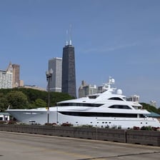 Yachts moored at docks in a marina