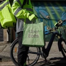Uber Eats delivery branding on a bicycle or delivery bag