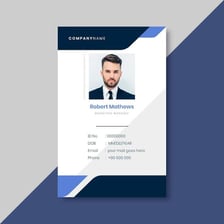 Identification cards displaying portrait photographs and personal information