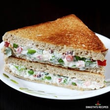 Mayonnaise spread on a sandwich.