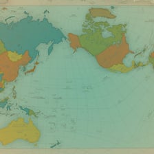 An open atlas displaying geographic maps