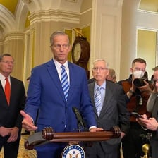 Politician speaking in the United States Senate chamber